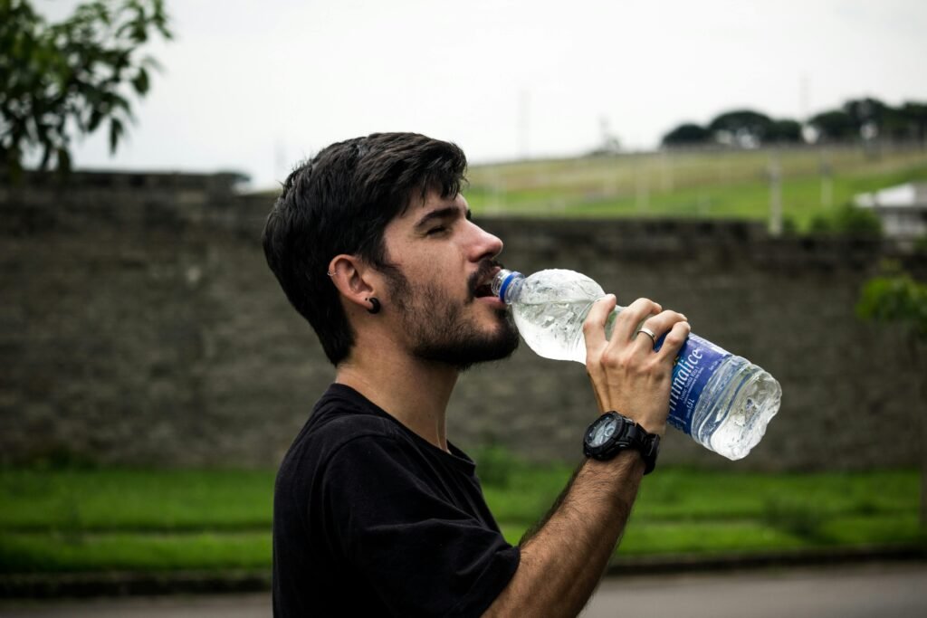 man drinking water